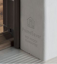 the frame saver logo is on the side of a building