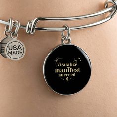 Our Manifest Success Affirmation bracelet a stunning piece of positive affirmation jewelry that comes packaged in a beautiful gift box, sent with tracking, ready to gift or recieve. This bangle is not only a fashionable accessory but also a powerful tool for manifesting new beginnings and attracting positivity into your life, daily.Crafted with exquisite attention to detail, the bracelet features a sleek design that combines elegance with a powerful daily affirmation. Our jewelry is made of high-quality surgical steel with a shatterproof liquid glass coating and an 18k gold finish option.➜ Engrave onto the back of the Manifest Success Affirmation bracelet your angel number, your desired affirmation, your loved one's name, your goal, wedding date, anniversary, or anything else you want to e Inspirational Round Bracelets As Gift, Meaningful Hypoallergenic Bracelet As Gift, Inspirational Hypoallergenic Jewelry For Best Friend Gift, Inspirational Hypoallergenic Jewelry For Best Friend, Meaningful Hypoallergenic Bracelets As Gifts, Inspirational Hypoallergenic Bracelets For Gift, Inspirational Nickel Free Bracelets As Gift, Inspirational Nickel-free Bracelets As Gift, Inspirational Nickel-free Bracelets As A Gift