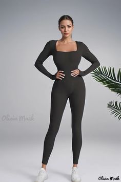 Olivia Mark - Seamless Tummy Control High-Performance Yoga Jumpsuit with Long Sleeves for Sculpting and Enhancing Physique High Stretch Shapewear Unitard, Fitted Seamless Jumpsuits And Rompers For Yoga, Fitted Solid Color Unitard For Pilates, Solid Color Fitted Unitard For Gym, Fitted Seamless Unitard For Yoga, Fitted Seamless Unitard For Gym, Seamless Fitted Unitard For Gym, Fitted Seamless Bodysuit For Pilates, Seamless Fitted Bodysuit For Pilates