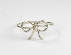 Sterling Silver Wire Bow Ring Bow Tie Ring Forget by FabulousWire Sterling Silver Jewelry With Ribbon For Gift, Sterling Silver Ribbon Jewelry For Gifts, Cute Butterfly Knot Jewelry For Gifts, Cute Jewelry With Butterfly Knot For Gifts, Silver Wedding Ring With Bow Detail, Silver Bow Jewelry As A Gift, Silver Bow Jewelry For Gift, Adjustable Butterfly Knot Jewelry Gift, Adjustable Butterfly Knot Jewelry For Gifts