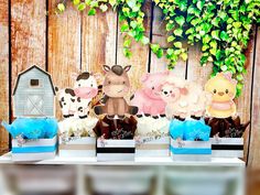 an assortment of farm animals are on display