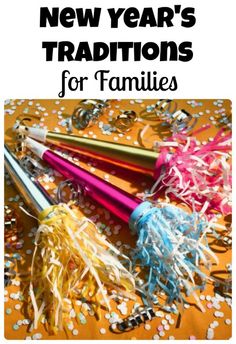 new year's decorations for families on a table with confetti and streamers