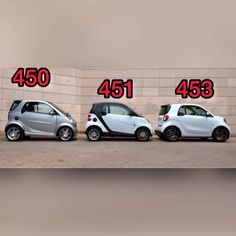 three smart cars parked in front of a building with the numbers 450, 453, and 433 written on them