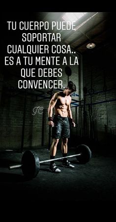 a shirtless man is standing on a barbell in an empty room with the words,