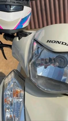 the headlight and tail light of a motor scooter