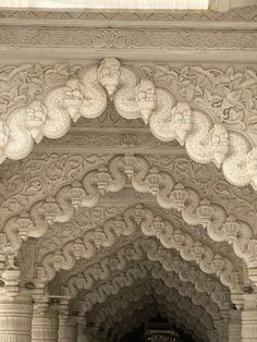 an ornate archway in the middle of a building