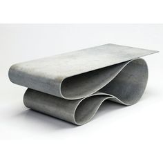 two concrete tubes stacked on top of each other in front of a white background,