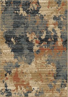 an area rug with various colors and patterns on it, including blue, brown, beige and