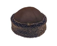 "Stay warm and stylish this winter with our handcrafted brown leather fur hat. Don't let the cold weather get you down! Stay warm and cozy with this handmade genuine leather fur cap. Unisex, water-resistant, and 100% leather. Made in Turkey. -Fashionable design and great fit - 100% Genuine Leather - High-quality -Warm and repels moisture - Handmade with natural sheepskin, the best hat for outdoors activities in the winter. -It is carefully stitched with real lambskin handcrafting using first class quality materials. Leather hat's inside is sheep fur, outside is lamb leather, which is our own production. It is wind proof and cold proof, it keeps your head warm in cold weather. -Since it is natural and real leather, it takes air and it does not sweat your head. Outer material: 100% lambskin. Brown Fleece-lined Cap, Brown Cap With Fleece Lining, Brown Hats With Ear Flaps For Cold Weather, Brown Ear Flaps Hat For Cold Weather, Brown Sheepskin Hat With Faux Fur Lining, Brown Hat With Plush Lining For Cold Weather, Brown Leather Hats With Faux Fur Lining, Brown Hat With Faux Fur Lining And Ear Flaps, Brown Hats With Faux Fur Lining And Ear Flaps