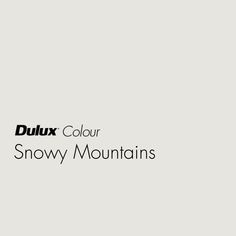 the logo for dulux color snow mountains