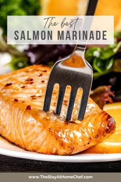 salmon on a white plate with a fork stuck in it and the words, the best salmon marinade