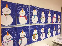 several snowmen are hanging on the wall