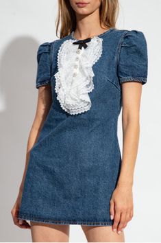 This daring dress features a lace bib panel that adds a touch of excitement to any outfit. Take your style to the next level and stand out from the crowd with this bold and unique mini dress! Medium-washed indigo denim Lace bib panel Short puff sleeves Crystal-embellished buttons 1: 100% Cotton; 2: 100% Polyester Colour may vary due to lighting on images. The product images (without model) are closest to the true colour of the product. Item runs true to size chart and is cut to suit our size cha Fitted Mini Dress With Lace Collar And Short Sleeve, Fitted Mini Dress With Lace Collar For Spring, Fitted Mini Denim Dress With Ruffles, Unique Mini Dress, Unique Mini Dresses, Floral Dress Shoes, Boho Swimwear, Vest Crop Top, Bodysuit Dress