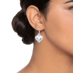 Add to your bold style with these sterling silver puff heart drop earrings. Add to your bold style with these sterling silver puff heart drop earrings. Nickel free Metal: sterling silver Backings: Frenchwire Packaging: boxed Plating: rhodium Finish: polished Diameter: 27.9 mm x 12.8 mm Size: One Size. Color: White. Gender: female. Age Group: adult. Valentine's Day Polished Finish Earrings, Polished Finish Heart Earrings For Gift, Sterling Silver Heart Earrings With Polished Finish, Teardrop Heart Earrings In Sterling Silver, Sterling Silver Heart Earrings With Heart Charm, Valentine's Day Teardrop Sterling Silver Heart Earrings, Puffed Heart, Heart Drop Earrings, Bold Style