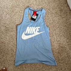 Shoulder To Bottom Is 26.5.” Armpit To Armpit Is 16.” Baby Blue. Tops Nike, Racer Back, Nike Tops, Baby Blue, Nike Women, Blue White, Color Blue, Blue And White, Tank Top