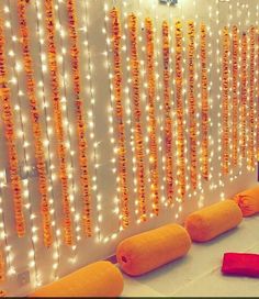 a room with lights and decorations on the wall