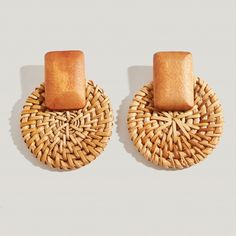 Embrace a bohemian-inspired look with these stunning rattan drop earrings. Handcrafted with intricate details, each earring features a beautifully rattan design in a natural, earthy tone. The drop silhouette adds a touch of elegance, while the lightweight construction ensures all-day comfort. These earrings are perfect for adding a touch of organic charm to your everyday outfits or for complementing your beachy, free-spirited ensembles. Versatile and timeless, they are an excellent choice for th Chic Brown Earrings For Summer, Chic Brown Summer Earrings, Chic Round Earrings For Summer, Chic Round Summer Earrings, Natural Color Spring Jewelry Gift, Spring Gift Jewelry In Natural Color, Natural Jewelry Gift For Spring, Spring Natural Color Jewelry Gift, Elegant Beige Earrings For Spring