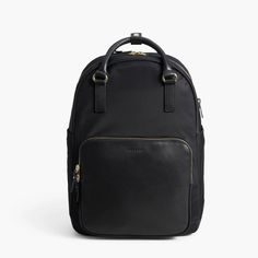 From Lo & Sons Website: A Do-It-All Nylon Backpack That Seamlessly Converts Into A Tote. Features Pockets To Keep Everything In Place, Qualifies As A Personal Item To Fit Underneath Any Airline Seat And A Separate Laptop Compartment Designed To Fit 13" Laptops In The Large (21l) And Some 13" Laptops In The Small (17l). Black Exterior / Gold Hardware / Lavender Interior Used Once, Like Brand New, Great For Travel/ Work! Lo And Sons Rowledge, Black Laptop Bag For Workwear, Black Backpack With Zipper For Work, Black Laptop Bag For Work, Black Travel Backpack With Leather Trim, Black Backpack With Leather Trim For Everyday Use, Black Backpack With Leather Trim For Travel, Everyday Black Backpack With Leather Trim, Commuting Backpack With Leather Trim