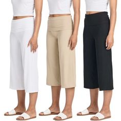 Revamp your casual wear with our Women's Wide Leg Capri Pants, designed to provide a blend of comfort and style. These capris feature a fashionable wide leg design, making them perfect for both lounging at home and practicing yoga. The capri length is just right for warmer seasons, giving you a relaxed yet stylish appearance with a boho and palazzo flair, and a foldover waistband. The elastic foldover waistband offers a comfortable fit, ensuring freedom of movement during any activity. Crafted f Casual Stretch Wide Leg Capris, Loosely Fitted Capris With Elastic Waistband, Versatile Cotton Capri Length Bottoms, Versatile Ankle-length Capris With Elastic Waistband, Versatile Capri Length Bottoms With Elastic Waistband, Versatile Relaxed Fit Capri Length Capris, Casual Solid Capris For Yoga, Casual Capri Yoga Pants With Elastic Waistband, Casual Yoga Capri Pants With Pockets