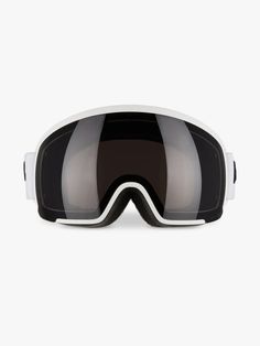 a pair of ski goggles sitting on top of a white surface