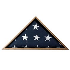 a triangle shaped flag with white stars on the top and blue bottom, hanging from a wooden frame