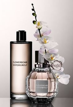 Flowerbomb (Viktor and Rolf) - Sambac Jasmine, Centifolia Rose, Cattleya Orchid, Ballerina Freesia, Patchouli. Flowerbomb Viktor And Rolf, Viktor And Rolf, Perfume Recipes, Bottle Display, Rose Perfume, Perfume Reviews