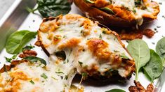 baked stuffed sweet potatoes with spinach leaves and cheese