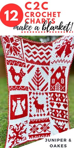 a red and white crochet pillow sitting on top of grass