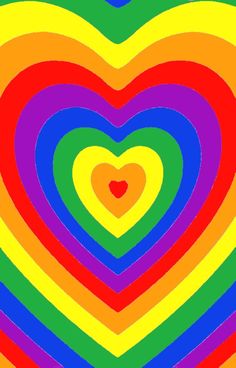 a multicolored heart is in the middle of an image