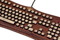 an old fashioned computer keyboard with many keys