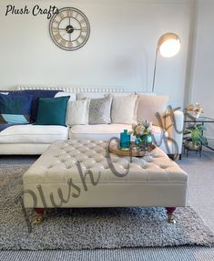 a living room filled with furniture and a clock on the wall