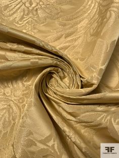 Content: Silk / Lurex / Blend Color: Warm Gold Width: 54 inches Elegant Brocade Fabric For Formal Occasions, Elegant Gold Fabric For Formal Occasions, Elegant Jacquard Fabric For Wedding, Gold Jacquard Fabric For Formal Occasions, Formal Gold Jacquard Fabric, Gold Elegant Jacquard Fabric, Elegant Gold Jacquard Fabric, Fitted Gold Jacquard Fabric, Gold Brocade