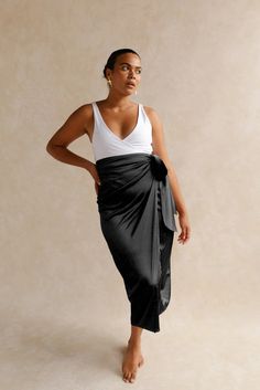 Isla Wrap Skirt Black | Beach Cover-up | Women's Evening Skirt – Baiia Swim Wrap Skirt Black, Evening Skirts, Black Beach, Reversible Bikinis, Beach Covers, Travel Companion, Synthetic Fabric, Skirt Black, Wrap Skirt