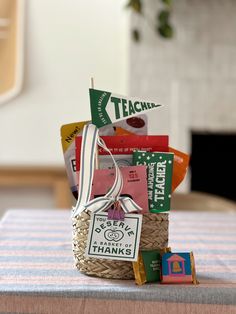 a basket filled with lots of different items on top of a table