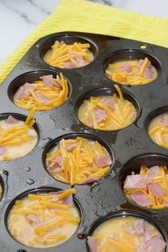 muffin tins filled with cheese and ham