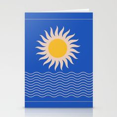 the sun is shining over the ocean waves on blue greeting card by artist and graphic designer lauren