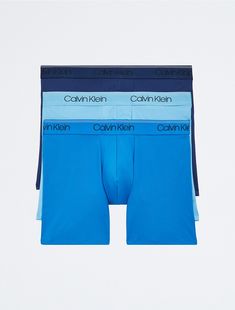 Maximum comfort with smooth microfiber stretch. These micro stretch boxer briefs are designed with a classic logo waistband and a contoured pouch for a supportive fit. Made with a wicking finish for quick-dry, all-day performance. Comes in a 3-pack.  Material: 88% Polyester, 12% Elastane. Classic Logo, Boxer Briefs, Briefs, Quick Dry, Calvin Klein, Pouch, Elastic, ? Logo