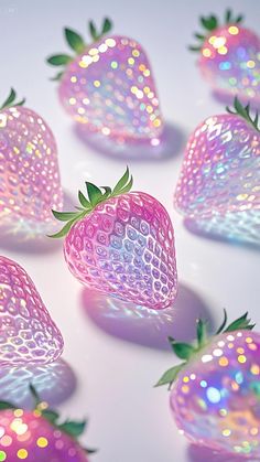 several shiny strawberries with green leaves on the top and one pink strawberry in the middle