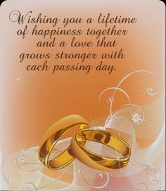 two gold wedding rings with the words wishing you a lifetime of happiness together and a love that grows younger with each passing day