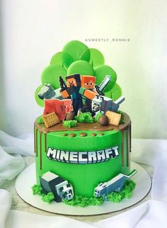 a minecraft themed cake is displayed on a table