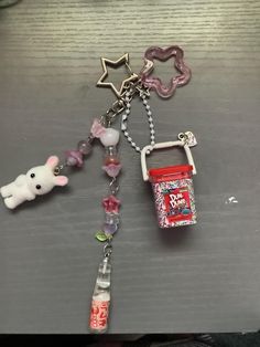 a key chain with some charms attached to it