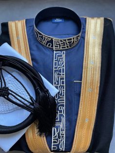 "This full set includes not just the thobe (An exquisite Saudi jubba) but also a pure wool bisht, kufi cap, 100% cotton scarf, and wool agal (igal). Each piece complements the other, creating a harmonious and sophisticated ensemble. This thobe set is perfect for special occasions like a nikah, weddings, Ramadan, Eid, or any moment where making a sophisticated statement is key. Luxurious Fabric: The thobe is expertly crafted using high-quality Japanese anti-static material Intricate Gold Embroidery: Each stitch reflects a commitment to impeccable attention to detail Handcrafted: Every element of the Light Grey Thobe Set is handmade with precision. What's Included: 1. Thobe x 1 2. Bisht x 1 3. 100% Cotton White Scarf (55\") x 1 4. Agal Of Your Choice x 1 5. Skull Cap x 1   Thobe Style: Saudi Traditional Sets With Gold Embroidery For Ceremony, Unstitched Sets With Gold Embroidery For Eid, Elegant Sets For Eid And Traditional Ceremonies, Traditional Ceremony Sets With Gold Embroidery, Sets With Gold Embroidery For Eid And Traditional Ceremonies, Eid Fitted Kaftan With Traditional Patterns, Elegant Unstitched Sets With Gold Embroidery, Gold Sets For Traditional Ceremonies With Traditional Drape, Black Wedding Sets With Gold Embroidery