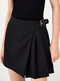 MO&Co. Women's Wool Blend Wrap Pleated Skort Features : - Mini length- Wrap front with buckle design- Pleated side sweep details Code: MBB1SOT012The back length of size S is 35cmMATERIALS & CARE Material: 55.9% Polyester 44.1% WoolDo not water wash, do not bleachHang to dry, do not tumble dryLow temperature iron, professional dry cleaningDo not expose to the sunNote: Wrap metal parts before dry cleaningPlease select your own size in the size chart according to your figure and serve model size as