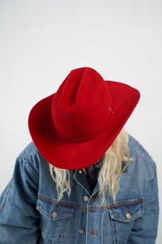 This updated version of our Vision cowboy style features a self-fabric band with a scalloped edge, sealed with a round silver stud. Still made with a center crease, and a flanged brim. Each hat is carefully crafted by hand in our Stockholm studio. Red Curved Brim Fedora For Winter, Red Western Hat For Fall, Red Western Fedora With Short Brim, Western Style Red Fedora With Short Brim, Western Red Hat Bands For Winter, Red Western Fedora Felt Hat, Western Red Fedora Felt Hat, Red Western Hat Bands For Winter, Western Red Felt Hat For Winter