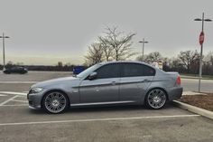 a silver car parked in a parking lot