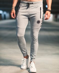 JERONE gray sweatpants. The butt looks good in these, women like it. Slim fit, two zippered front pockets and elasticated waist and cuffs. Urban Style Gray Joggers For Sports, Urban Gray Joggers For Sports, Gray Stretch Sweatpants With Side Pockets, Urban Style Stretch Sweatpants For Jogging, Urban Gray Sweatpants For Sports, Urban Style Gray Sweatpants For Sports, Gray Sporty Joggers For Streetwear, Gray Athleisure Sweatpants For Jogging, Gray Joggers With Side Pockets For Jogging