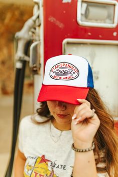 Our Star Spangled Cowgirl Trucker Hat is a firecracker of a statement piece that celebrates the fierce spirit of the cowgirl and the unwavering American dream. Crafted for comfort and style, this foam cap features a 100% polyester front and a breathable mesh back. With an adjustable snap closure, it ensures the perfect fit for all head sizes. One Size Fits Most Real Turquoise Jewelry, Rodeo Fashion, 4th Of July Outfits, Star Spangled, American Dream, Cowgirl Boots, Red White And Blue, Hat Hairstyles, Long Sweaters