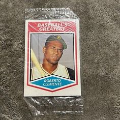 a baseball card with the image of roberto clemente on it's back side