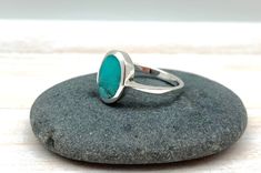 Hi everyone, just wanted to let you know we are open and shipping daily. Simple Turquoise Ring - Oval Turquoise Flat Ring - Modern Minimalist Turquoise Ring - Unisex Turquoise - Turquoise Size 5, 6, 7, 8, 9, 10 Sizes 5, 6, 7, 8, 9, 10 Face Height: 18mm Weight: 5 grams Metal 925 Sterling Silver Hallmark 925 Band: 3mm Blue Band, Turquoise Rings, Ring Photos, Signet Ring, Turquoise Stone, Sterling Ring, Modern Minimalist, Stone Rings, Turquoise Ring