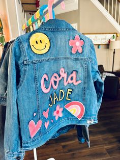 These custom jean jackets are perfect for any occasion or just for fun! Multicolor Denim Jacket With Patches For Spring, Multicolor Patched Denim Jacket For Spring, Customizable Denim Jacket For Fall, Fun Cotton Denim Jacket For Fall, Fun Spring Denim Jacket, Fun Cotton Outerwear For Spring, Cute Medium Wash Denim Jacket For Spring, Spring Denim Outerwear Hand Painted, Spring Hand Painted Denim Outerwear